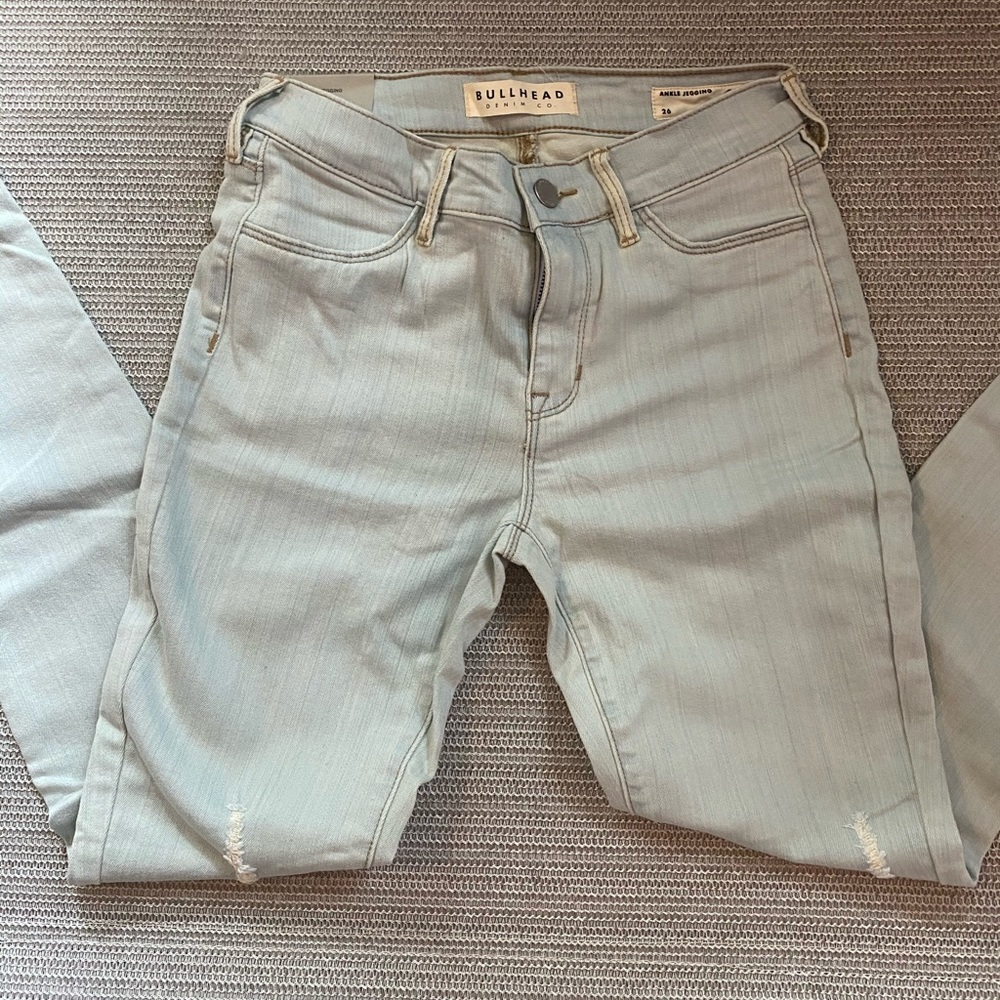 Light wash denim jeans. NWT